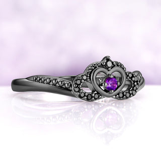 Angled view of the contoured heart and crown band, showing the curve that nests against the engagement ring