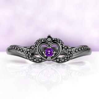 Heart and crown band from the Claddagh set, an open heart holding a round natural amethyst on a beaded black ruthenium band