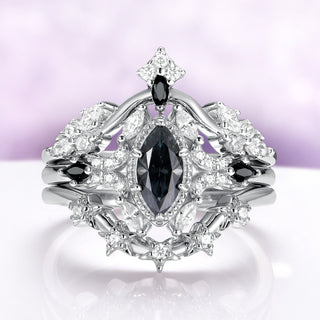 The three rings nested together with the crown band above and the star band below