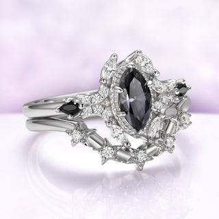 Angled view of the milgrain frame, marquise corner accents and black onyx shoulder stones