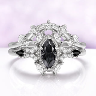 The set worn with the star contour band sitting above the engagement ring