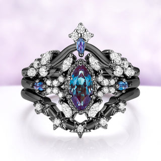 Lab-grown alexandrite bridal ring set in black ruthenium, all three rings stacked
