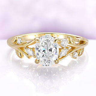 Oval lab-grown diamond leaf and vine engagement ring in solid 14K yellow gold
