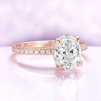 Oval Lab-Grown Diamond Hidden Halo Solitaire Engagement Ring in 14K Solid Rose Gold (IGI Certified) by Aquamarise Gold, featuring a pavé diamond band in a delicate hidden halo setting.
