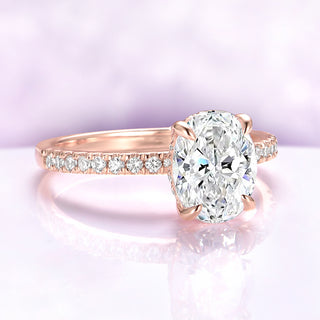 Oval Lab-Grown Diamond Hidden Halo Solitaire Engagement Ring in 14K Solid Rose Gold (IGI Certified) by Aquamarise Gold, featuring a pavé diamond band in a delicate hidden halo setting.