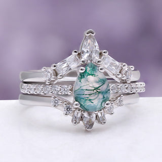 Pear Green Moss Agate Three-Piece Bridal Ring Set in Sterling Silver by Aquamarise, angled view showing all three stacked rhodium-finished bands.