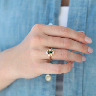Unique emerald engagement ring by Aquamarise