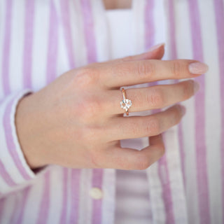 Unique white sapphire engagement ring by Aquamarise