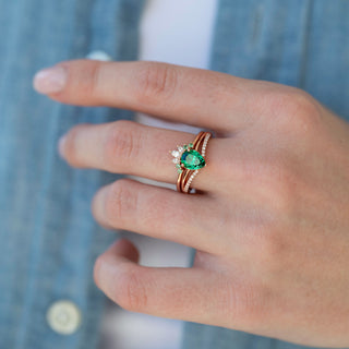 Unique emerald engagement ring set by Aquamarise