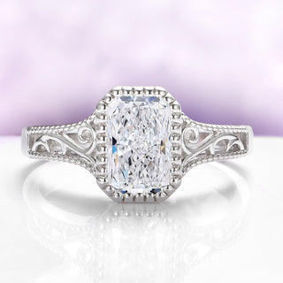 Lab Grown Diamond Engagement Ring in 14K White Gold (IGI Certified) by Aquamarise Gold, featuring a radiant cut diamond with intricate filigree details on the band.