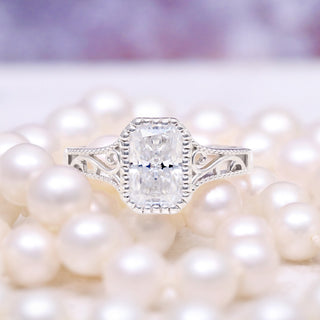 Lab Grown Diamond Engagement Ring in 14K White Gold (IGI Certified) by Aquamarise Gold, featuring a radiant-cut diamond with intricate filigree on a white gold band surrounded by pearls.
