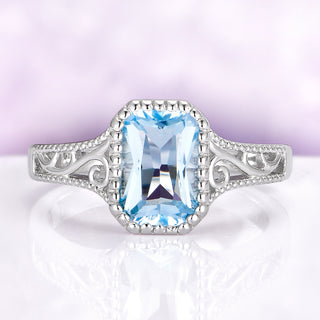 Radiant Cut Sky Blue Topaz Ring, Sterling Silver Vintage Halo Engagement Ring, December Birthstone Ring
