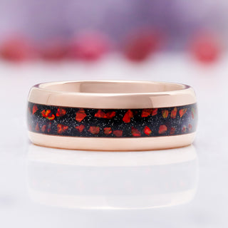 Close-up of the crushed red fire opal and galaxy sandstone inlay channel