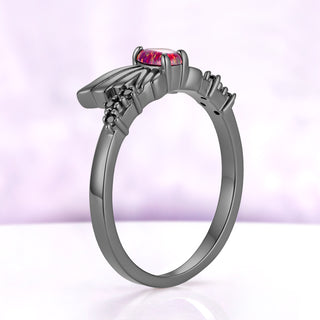 Side profile of the Selene wing ring in black ruthenium, showing how the wings rise from the slim band