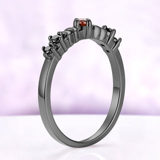 Side profile of the Selene moon band in black ruthenium, a slim straight band with low-set stones