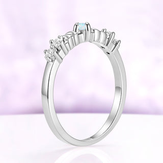 Side profile of the silver Selene crescent moon band, a slim straight band with low-set stones