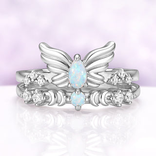 Silver Selene wing ring stacked with the Selene white opal crescent moon band, sold separately