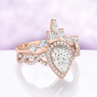 Simulated Diamond Engagement Ring Set in 14K Rose Gold Vermeil by Aquamarise, angled view of the pear-cut halo ring paired with its crown band.