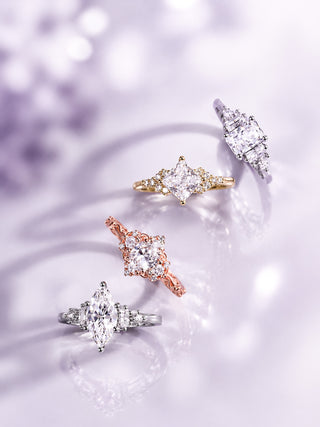 Solid gold and platinum engagement rings by Aquamarise shown in the collection hero banner