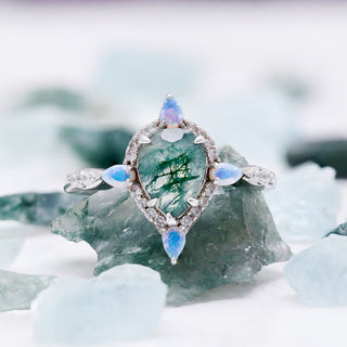 Teardrop Green Moss Agate & Fire Opal Engagement Ring in Sterling Silver by Aquamarise, a pear-cut moss agate with marquise opal accents on aquamarine stones.