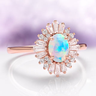 Rose gold ring with an opal stone and diamond accents on a light purple background