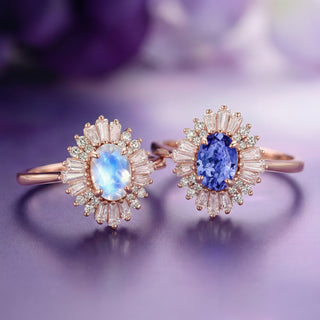 Two rose gold rings with gemstones on a purple background