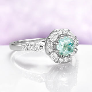 Vintage Octagon Halo Green Amethyst Ring in Sterling Silver by Aquamarise, featuring a 0.85 carat green amethyst with baguette and round simulated diamond halo on a rhodium-finished band.