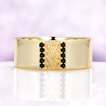 Mens 8mm yellow gold vermeil wedding band with a carved leaf panel and black onyx channels