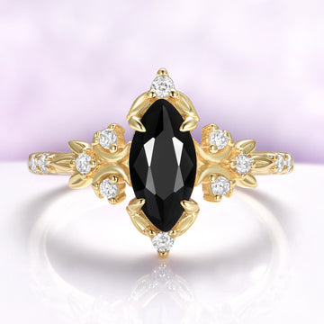 Marquise black onyx engagement ring in 14K yellow gold vermeil with crescent moons and leaf shoulders