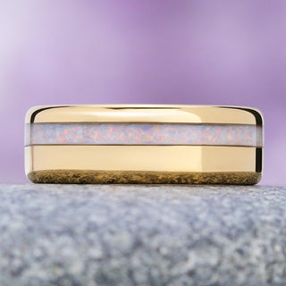 White fire opal men's wedding band in polished yellow gold tungsten, 8mm, crushed opal channel flashing pink and blue