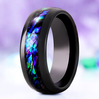 Abalone Shell men's wedding band in polished black tungsten, 8mm, standing upright with the iridescent blue, green and purple abalone inlay
