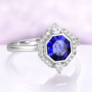 Asscher Cut Art Deco Bezel Set Blue Sapphire Ring in Sterling Silver by Aquamarise, featuring a deep blue sapphire with diamond accents on a polished sterling silver band.