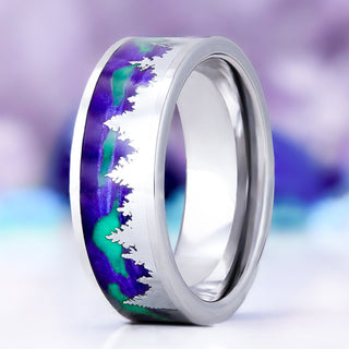 Aurora borealis northern lights and trees men's wedding band in tungsten, 8mm, standing view showing the pine silhouettes against the purple and green aurora inlay
