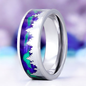 Aurora borealis northern lights and trees men's wedding band in tungsten, 8mm, standing view showing the pine silhouettes against the purple and green aurora inlay