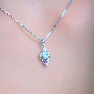 Model wearing the Carmilla moissanite and amethyst pendant necklace in sterling silver