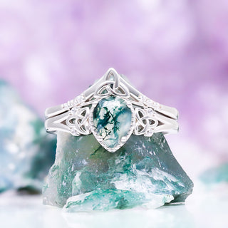 Her side of the set: pear cut natural moss agate Celtic knot engagement ring and matching chevron band in sterling silver