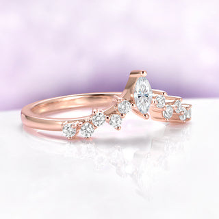 Chevron Curved Wedding Band in 14K Rose Gold Vermeil by Aquamarise, featuring a marquise-cut center stone with round diamond accents on a delicate curved rose gold vermeil band.