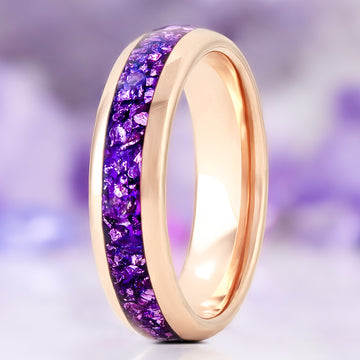 Crushed amethyst men's wedding band in rose gold tungsten carbide, 6mm, standing view showing the purple inlay and polished domed edges