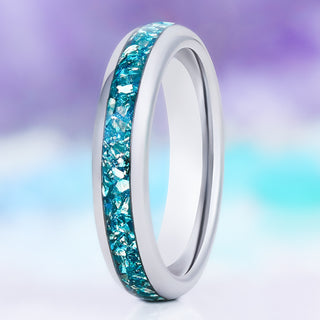 Crushed aquamarine wedding band in silver tungsten carbide, 4mm, standing view showing the full teal inlay and polished domed band