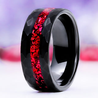 Crushed Red Garnet men's wedding band in hammered black tungsten, 8mm, standing upright to show the vivid red garnet center channel