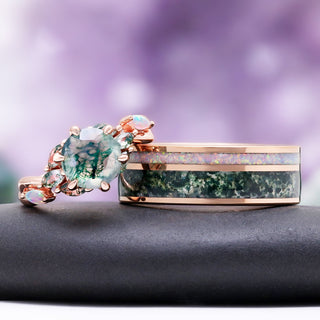 Enchanted Garden moss agate and fire opal couples ring set side by side, rose gold engagement ring beside the men's opal and moss agate inlay band