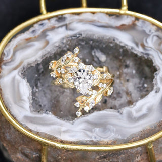 Natural geode ring box by Aquamarise holding a Wisteria diamond engagement ring inside its crystal interior