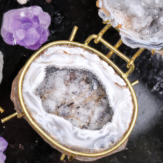 Smoke Agate Grey geode ring box by Aquamarise holding a ring in its crystal-lined interior