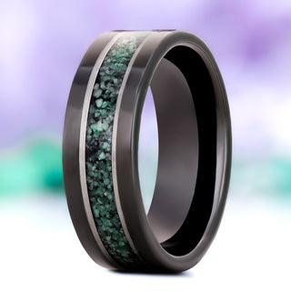 Green moss agate men's wedding band in two tone black tungsten carbide, 8mm, standing view showing the off-set green inlay with its silver edge