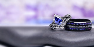 Matching couples rings: sapphire halo bridal set and black galaxy inlay band