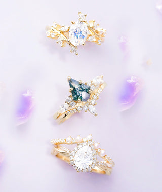 Fantasy-inspired non-traditional engagement rings with unique gemstones in gold settings.