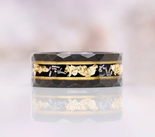 Black Onyx & Meteorite Gold Leaf Couples Ring Set featuring a faceted black band with shimmering meteorite flakes and gold leaf accents, crafted by Aquamarise for meaningful Matching Couples' Rings.