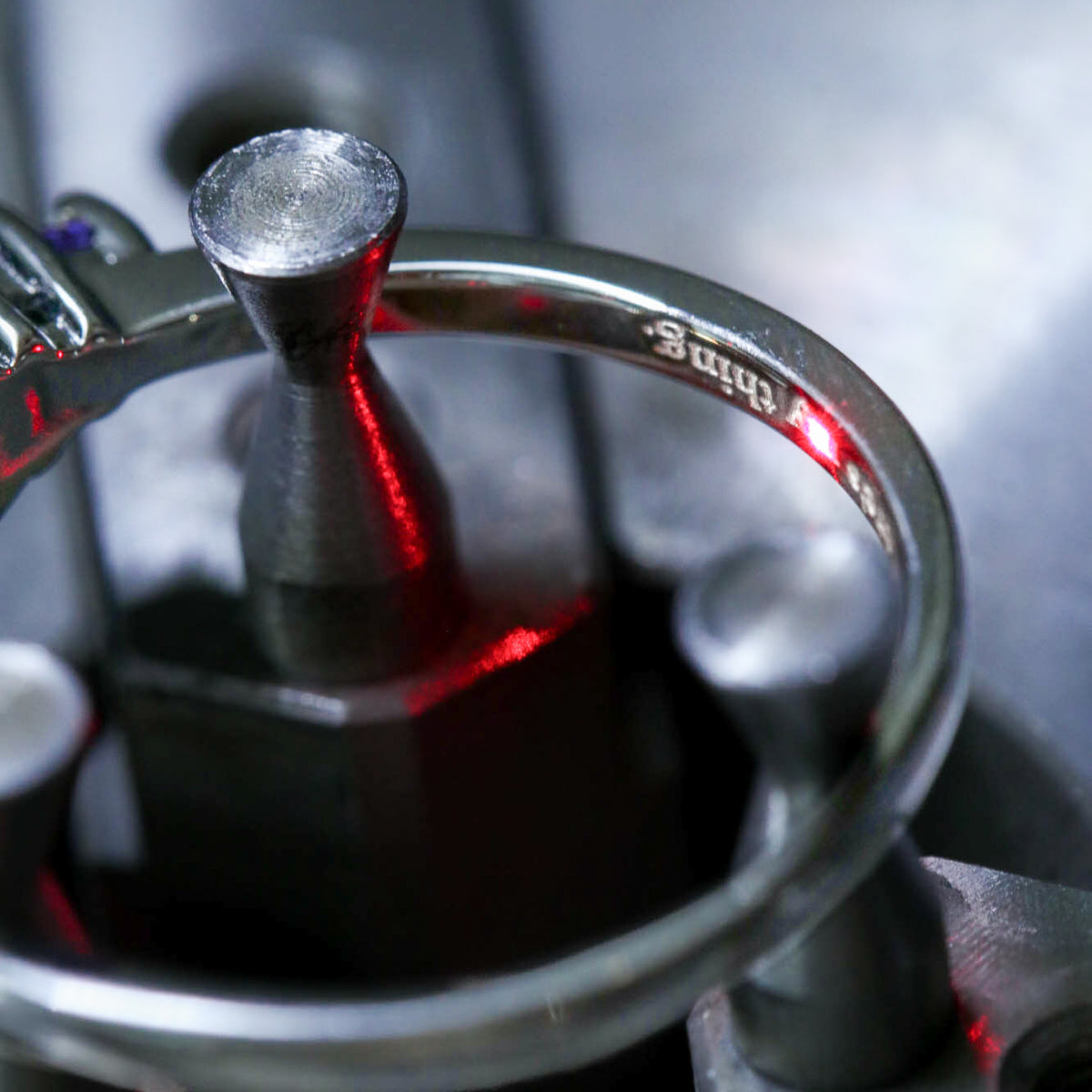 Laser engraving inside an Aquamarise ring