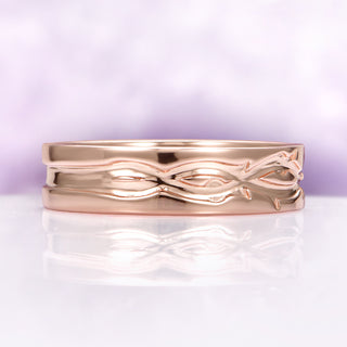 Nature Inspired Leaf Engraved Wedding Band in 14K Solid Rose Gold by Aquamarise Gold, featuring a polished band with intricate raised leaf detailing for a timeless, elegant look.