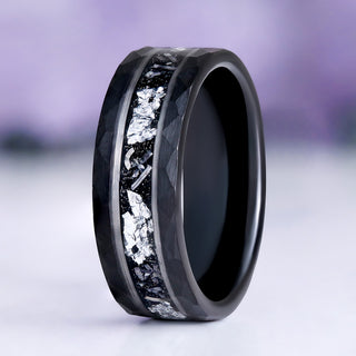 Meteorite and silver leaf tungsten wedding band by Aquamarise, close-up of the meteorite and silver leaf inlay